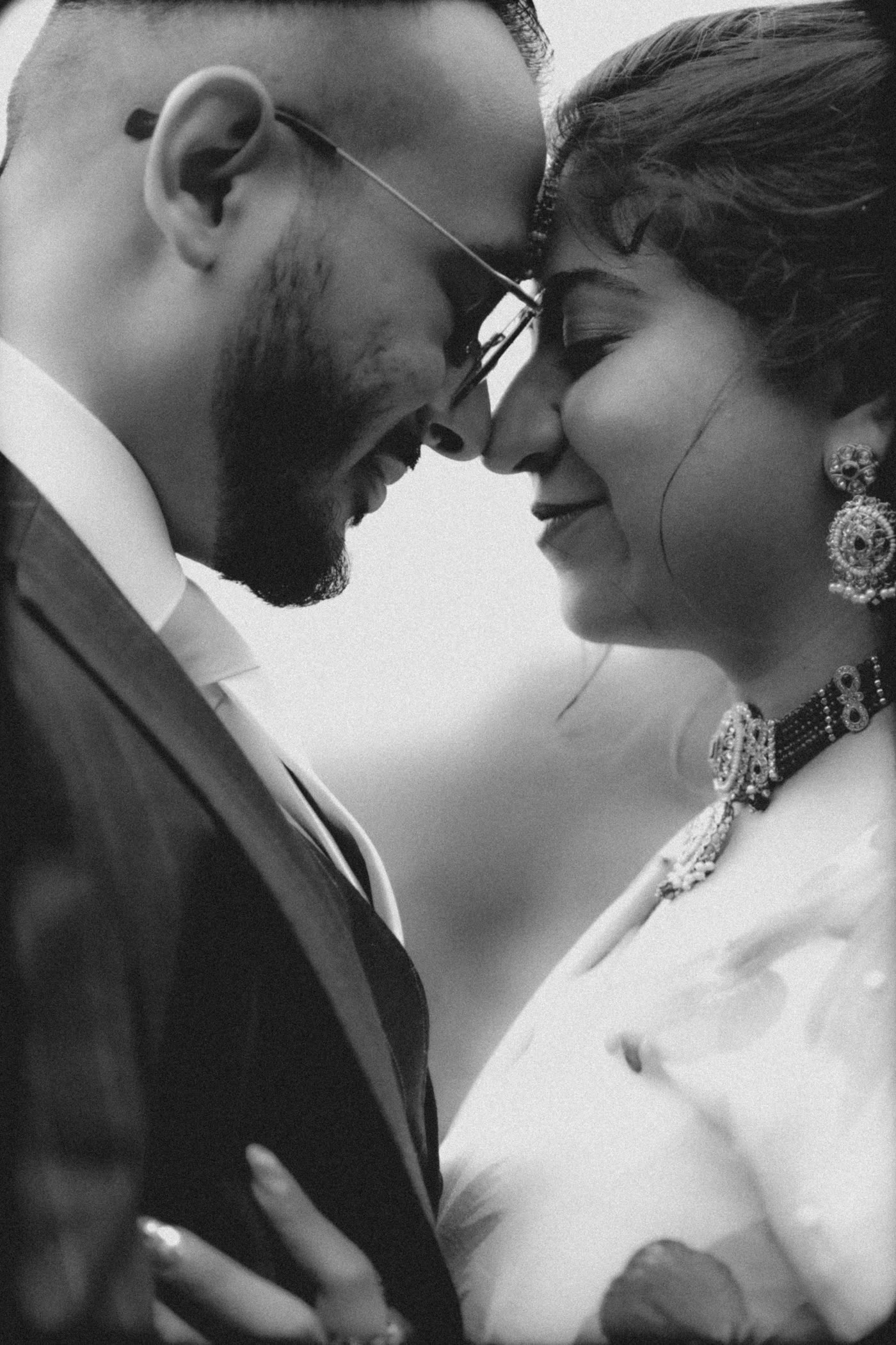 Foreheads together, in black and white