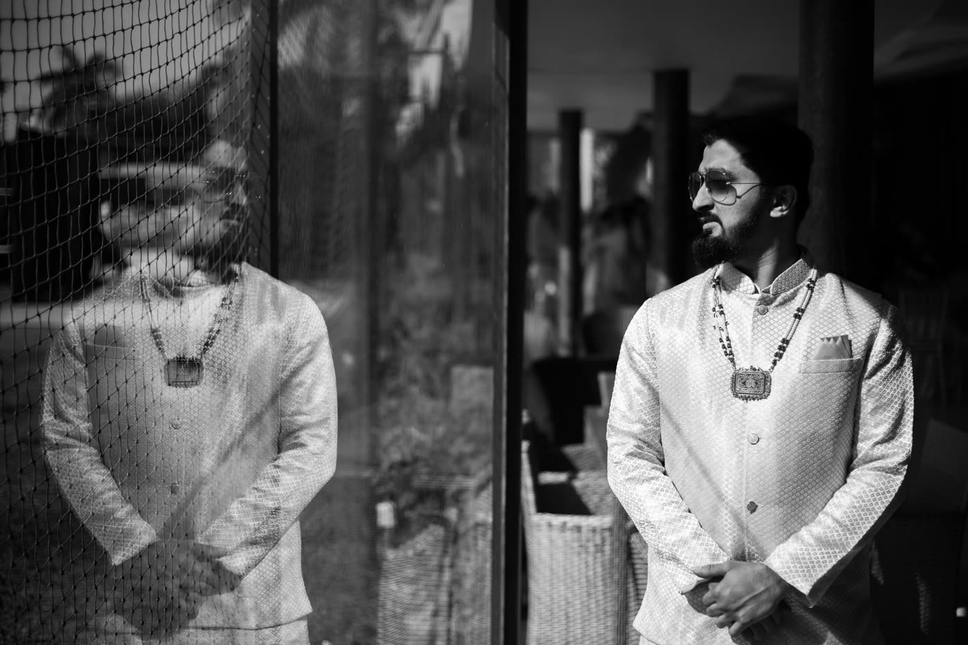 A groom waiting, in black and white
