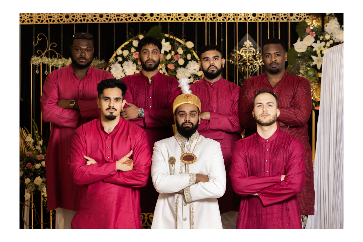 Groomsmen dressed in red